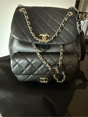 Quilted Black Leather Backpack with Gold Chain Detail